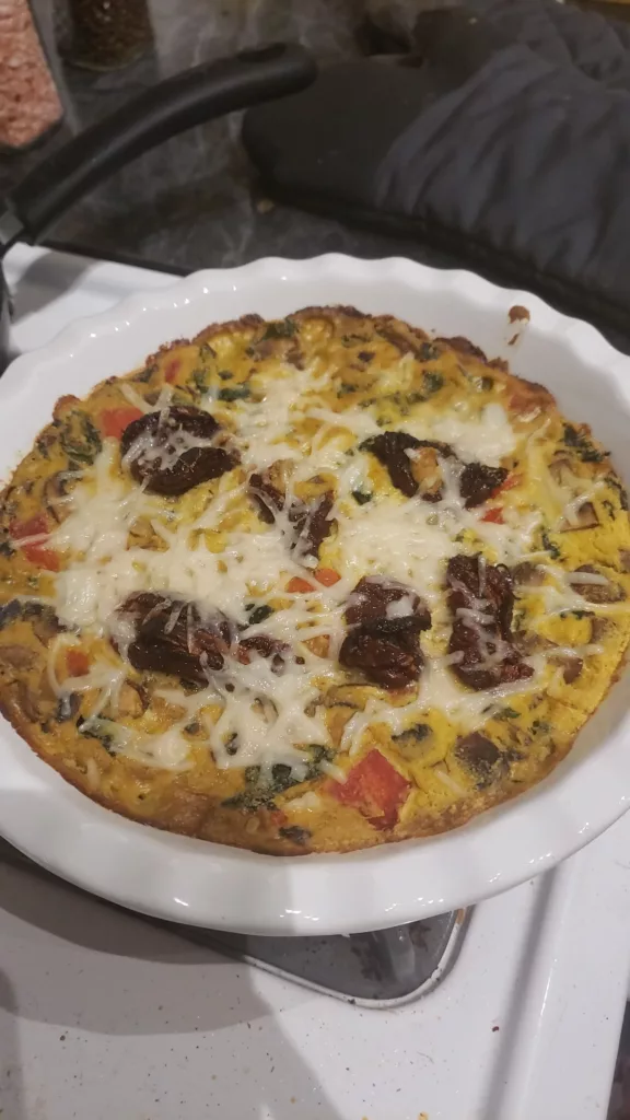 a chickpea quiche with sundried tomatoes on top